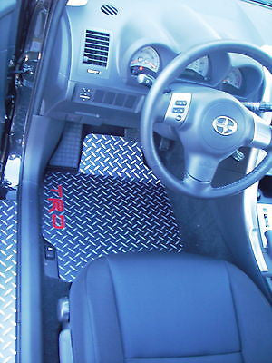 tC 04-10 TRD   Black With Exposed METAL silver diamond floor mats.  FRONT pair