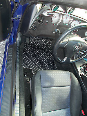 Supra 93-02   Aluminum diamond plate floor mats.  Driver and passenger side pair